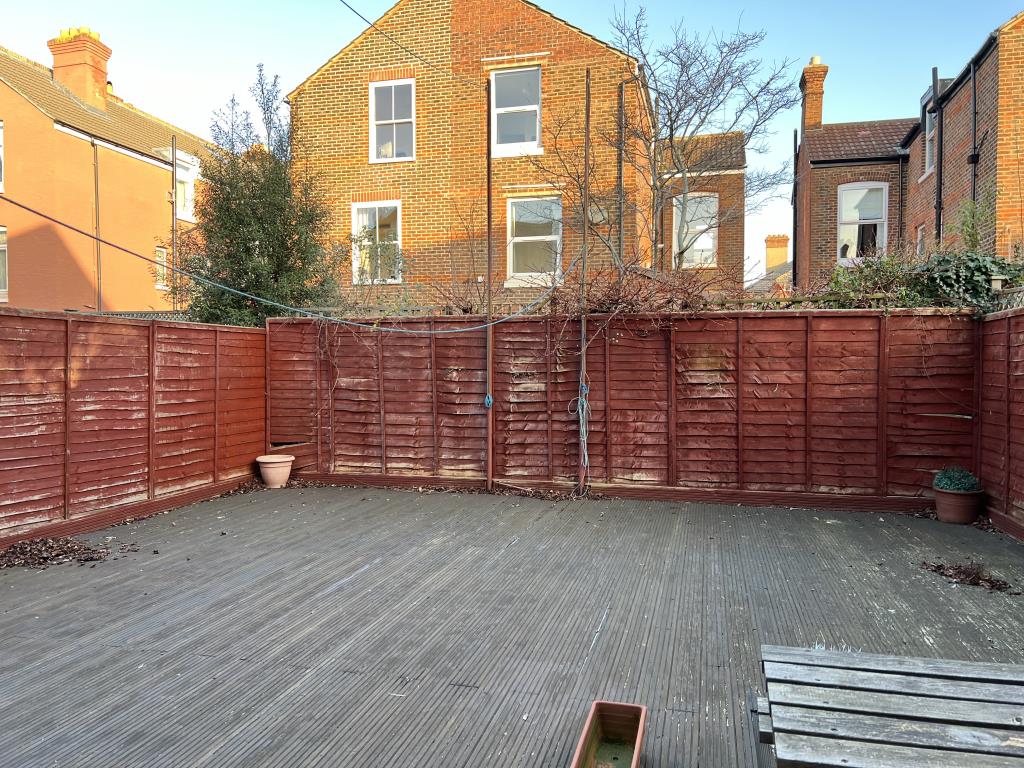 Lot: 114 - SUBSTANTIAL SEMI-DETACHED HOUSE FOR IMPROVEMENT - Garden with decking and fencing